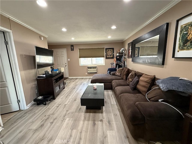 living area featuring a wall unit AC, light wood finished floors, ornamental molding, and recessed lighting