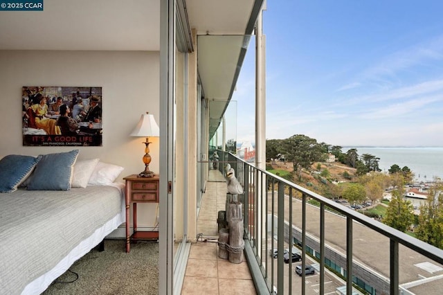 balcony featuring a water view