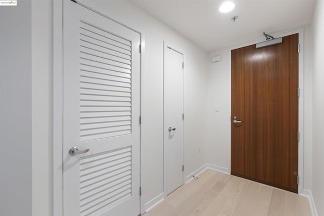 corridor featuring light hardwood / wood-style flooring