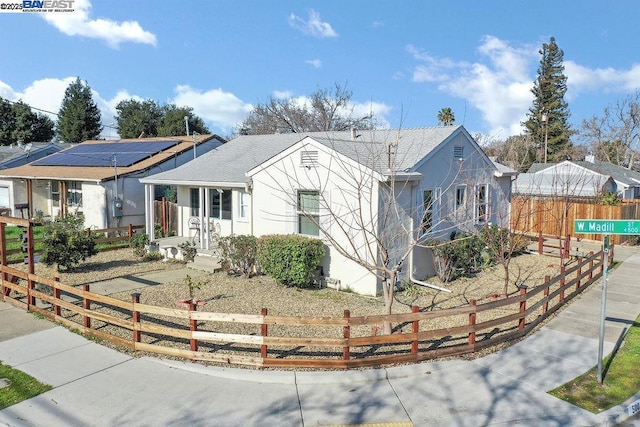 view of front of house with solar panels