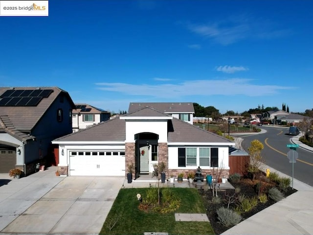 front facade with a garage