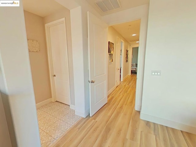 hallway featuring light hardwood / wood-style floors