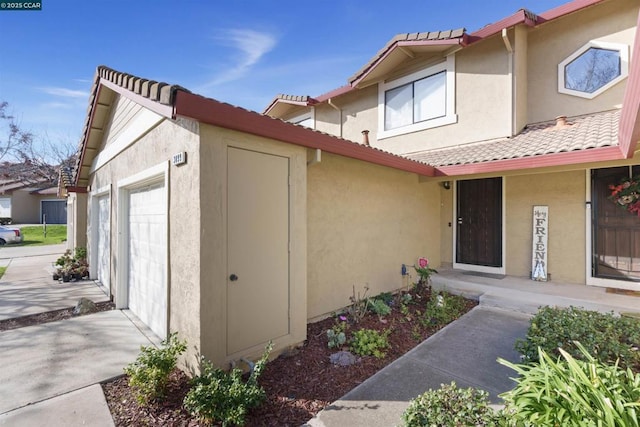 exterior space featuring a garage