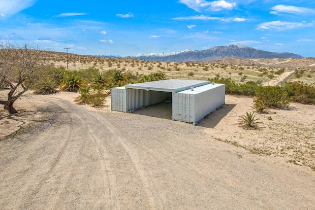 exterior space featuring a mountain view