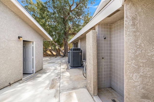 view of patio with cooling unit