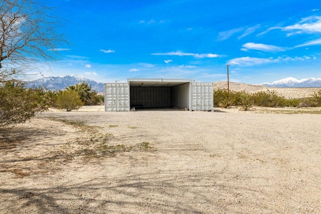 view of outdoor structure featuring a mountain view