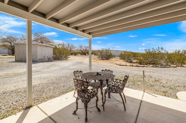 view of patio / terrace featuring an outdoor structure