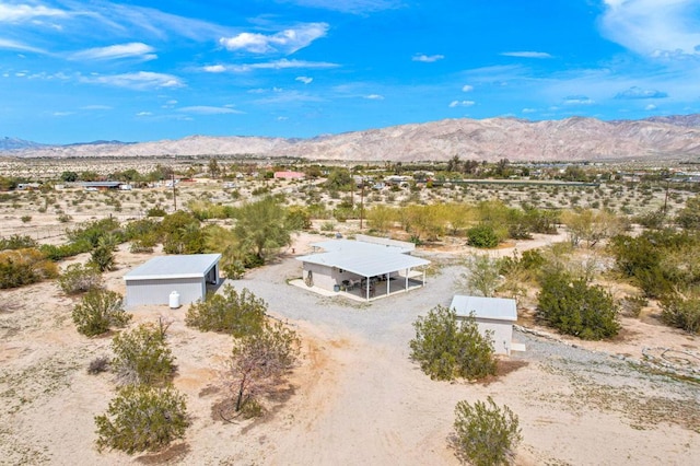 drone / aerial view featuring a mountain view