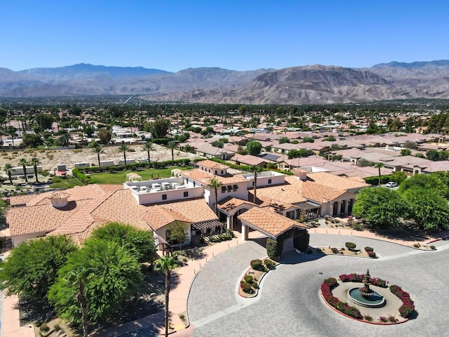 drone / aerial view featuring a mountain view