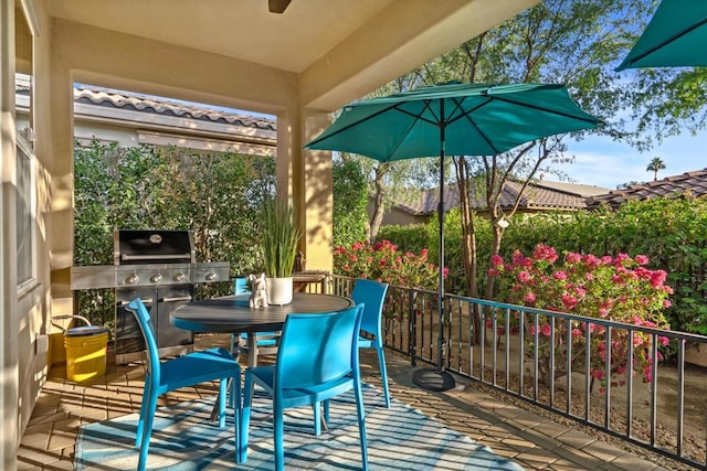 exterior space featuring ceiling fan