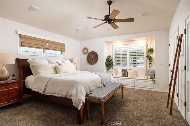 carpeted bedroom featuring ceiling fan