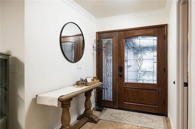 tiled foyer featuring ornamental molding