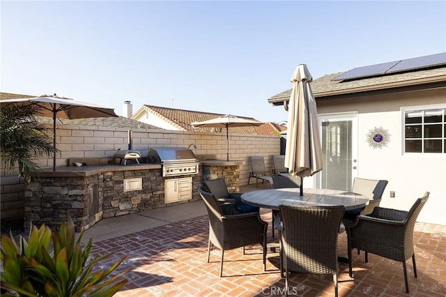 view of patio featuring a grill and area for grilling