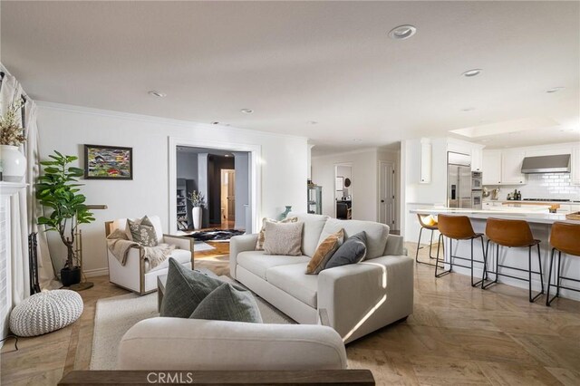 living room with crown molding