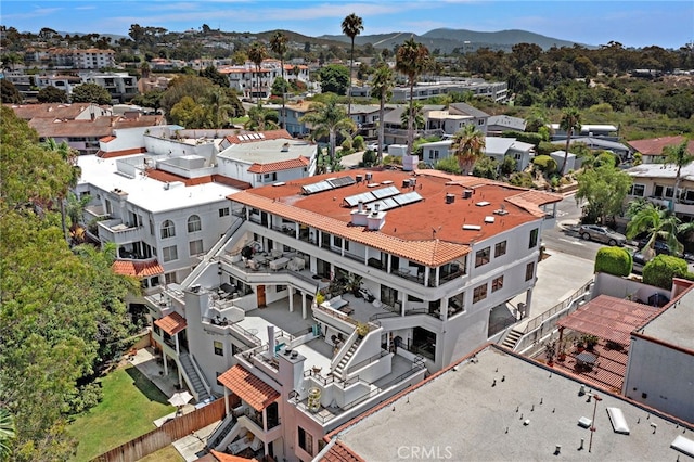 drone / aerial view featuring a mountain view