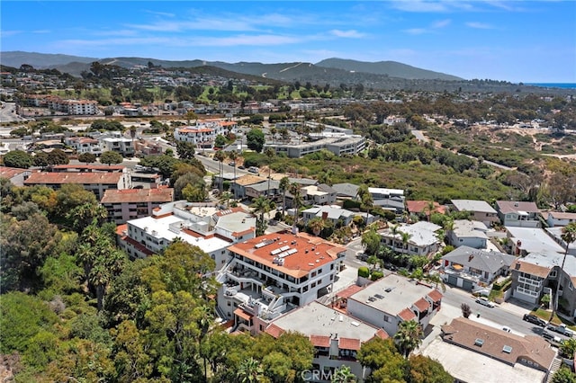 birds eye view of property featuring a mountain view