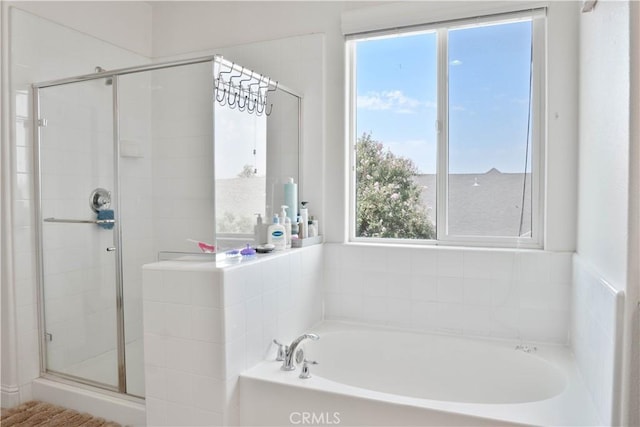 1714 Graybark Ave, Clovis, CA 93619 - bathroom featuring a bath and a stall shower