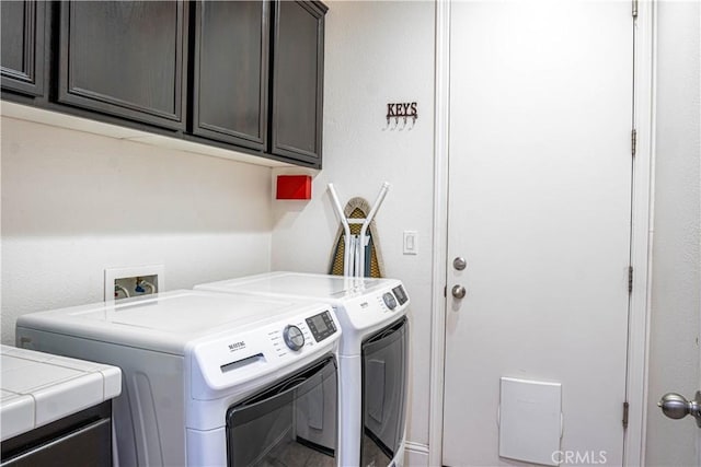 1714 Graybark Ave, Clovis, CA 93619 - laundry room with washing machine and clothes dryer and cabinet space