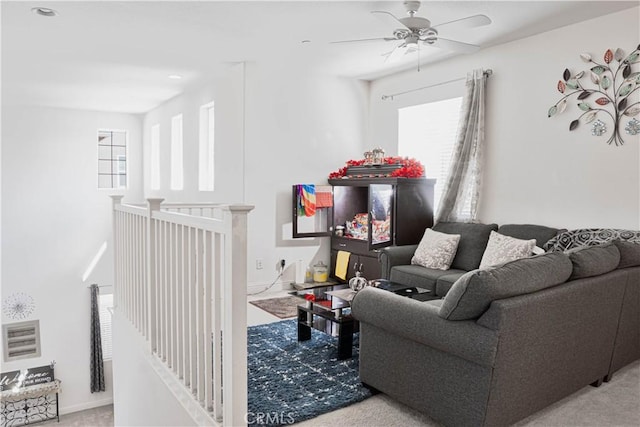 1714 Graybark Ave, Clovis, CA 93619 - carpeted living room featuring ceiling fan, baseboards, and visible vents