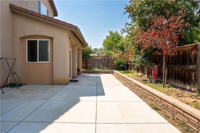 1714 Graybark Ave, Clovis, CA 93619 - view of patio / terrace with a fenced backyard