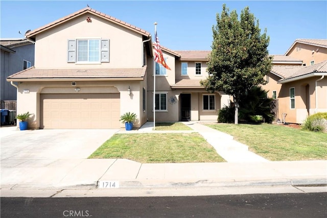 1714 Graybark Ave, Clovis, CA 93619 - view of front facade with a garage, stucco siding, a tiled roof, and a front lawn