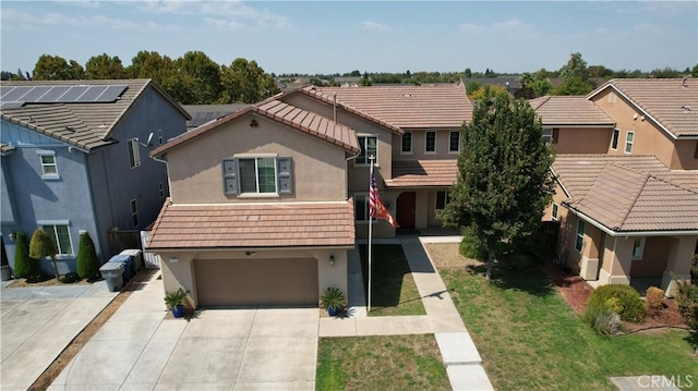 1714 Graybark Ave, Clovis, CA 93619 - view of front of property featuring a tiled roof, a garage, stucco siding, a front lawn, and driveway