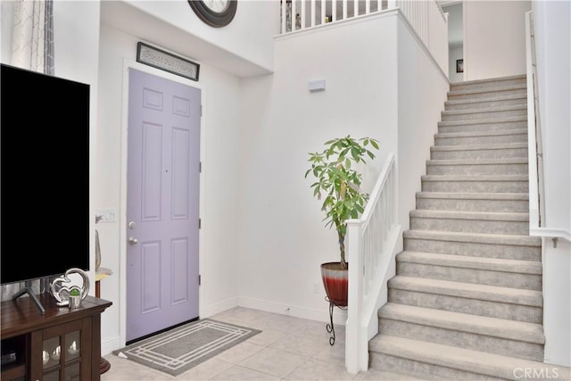 1714 Graybark Ave, Clovis, CA 93619 - foyer entrance featuring light tile patterned floors, baseboards, and stairs