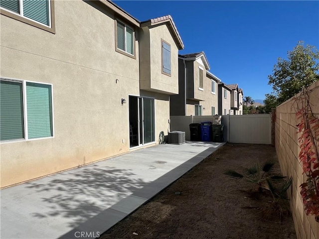 exterior space featuring a patio area and central AC unit