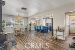 living room featuring dark hardwood / wood-style flooring