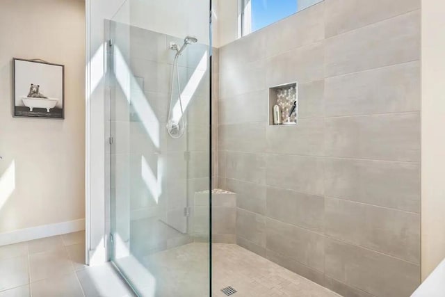 bathroom featuring tiled shower