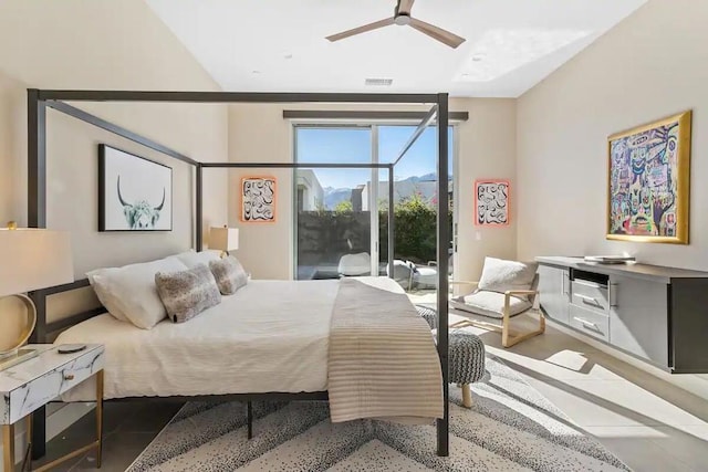 bedroom with ceiling fan and access to exterior