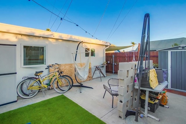 view of patio / terrace with a storage shed