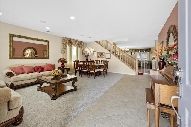 living room featuring light carpet and a chandelier