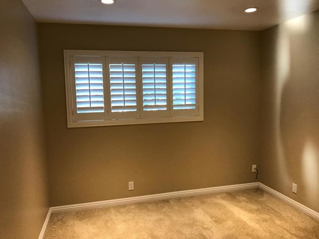 view of carpeted spare room