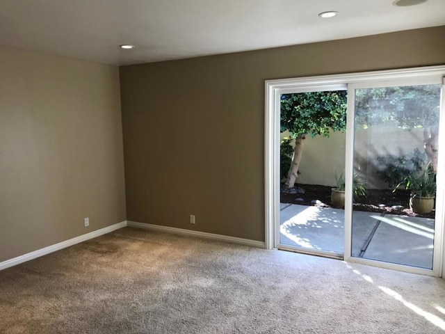 spare room with carpet flooring