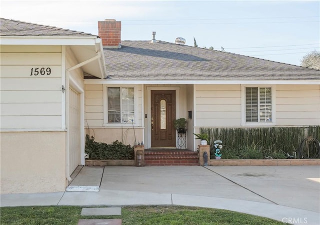 entrance to property with a garage