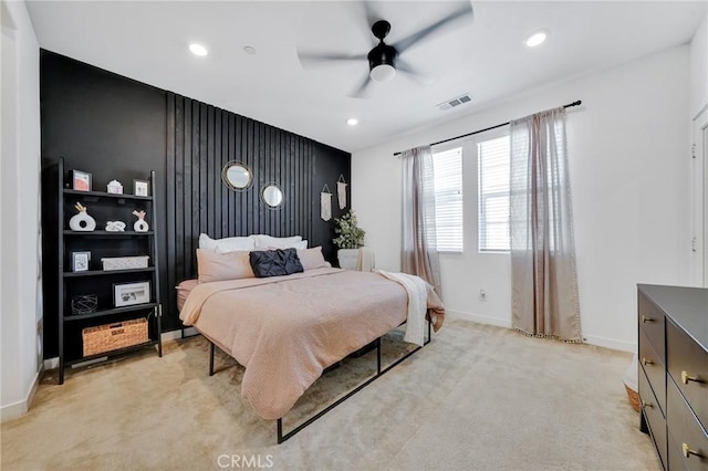 carpeted bedroom with ceiling fan