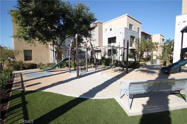 view of home's community featuring a playground