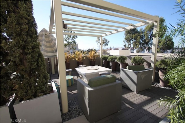 wooden terrace featuring a pergola