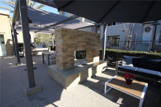 view of patio featuring a pergola and outdoor lounge area