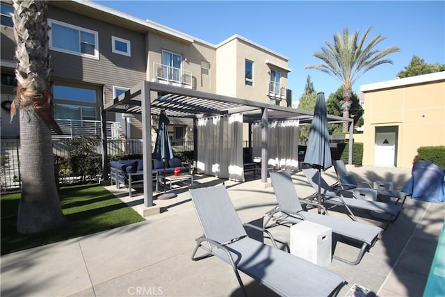 view of patio featuring an outdoor hangout area and a pergola