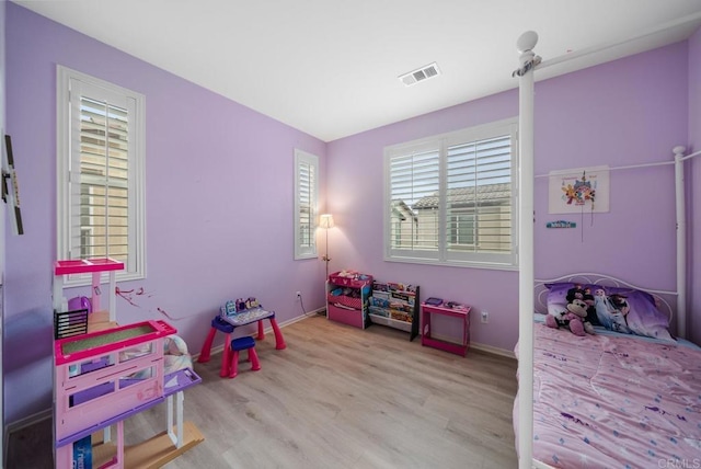 rec room featuring light hardwood / wood-style floors