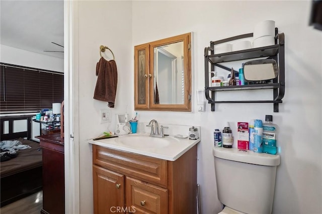 bathroom with vanity and toilet