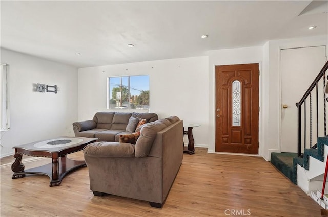 living room with light hardwood / wood-style flooring