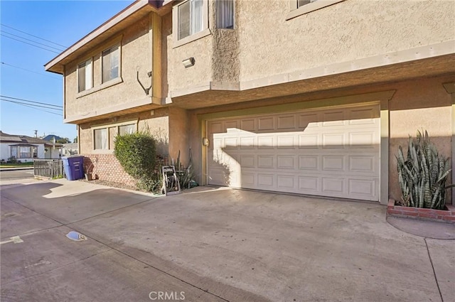 exterior space with a garage