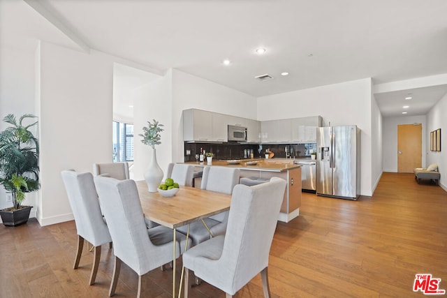 dining area featuring light hardwood / wood-style flooring