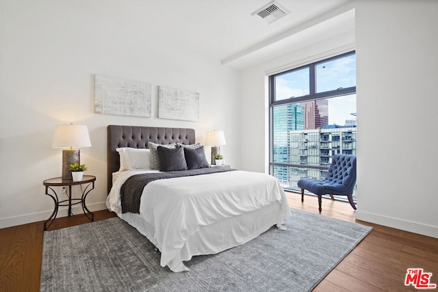 bedroom featuring wood-type flooring