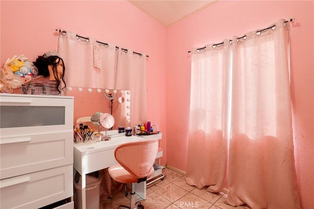 bathroom with tile patterned flooring