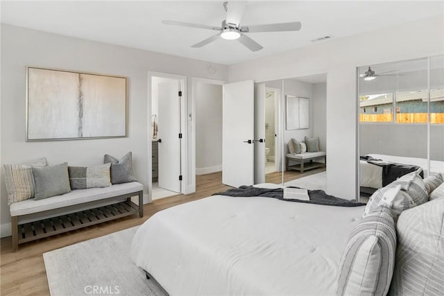 bedroom featuring light hardwood / wood-style flooring and ceiling fan