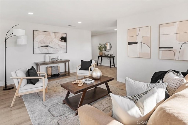 living room with light hardwood / wood-style floors